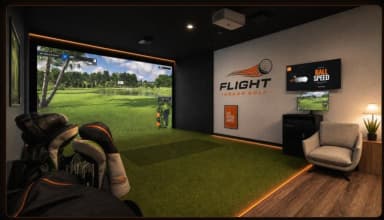 TrackMan indoor golf simulator bay at Flight Indoor Golf in Hockessin, Delaware