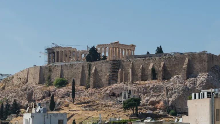 The Acropolis and Parthenon on a hill above Athens, Greece