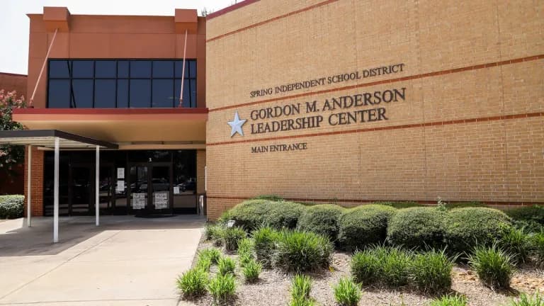 Spring ISD's Gordon M. Anderson Leadership Center, a tan brick building with the district's name on the facade