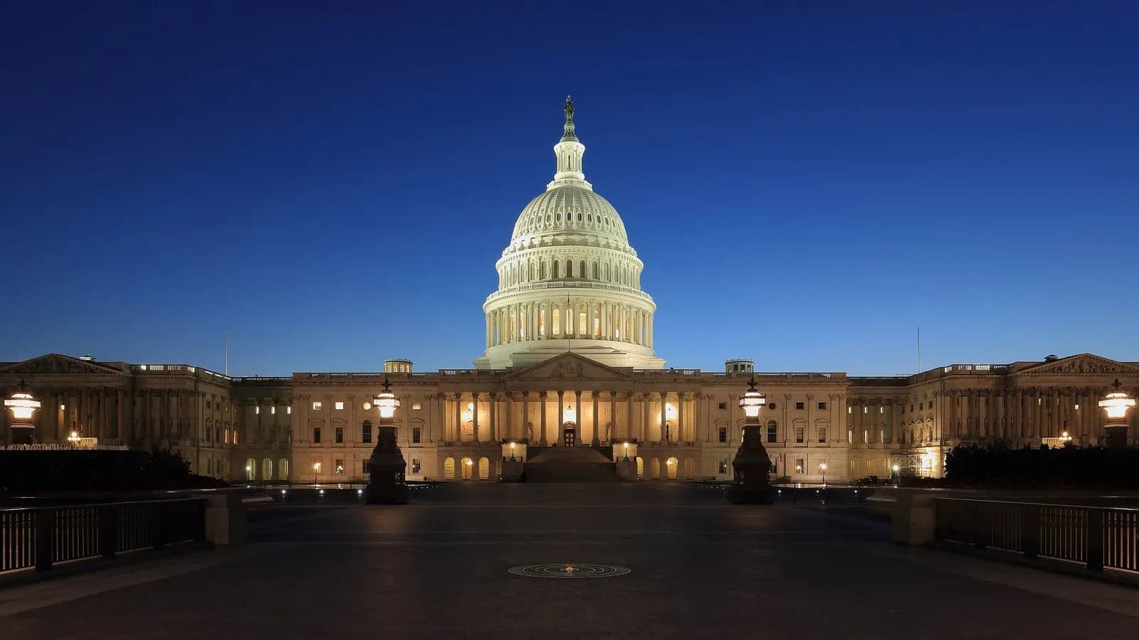 The U.S. Capitol dome lit at dusk