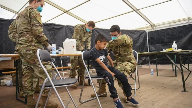 Medical staff administering MMR vaccines