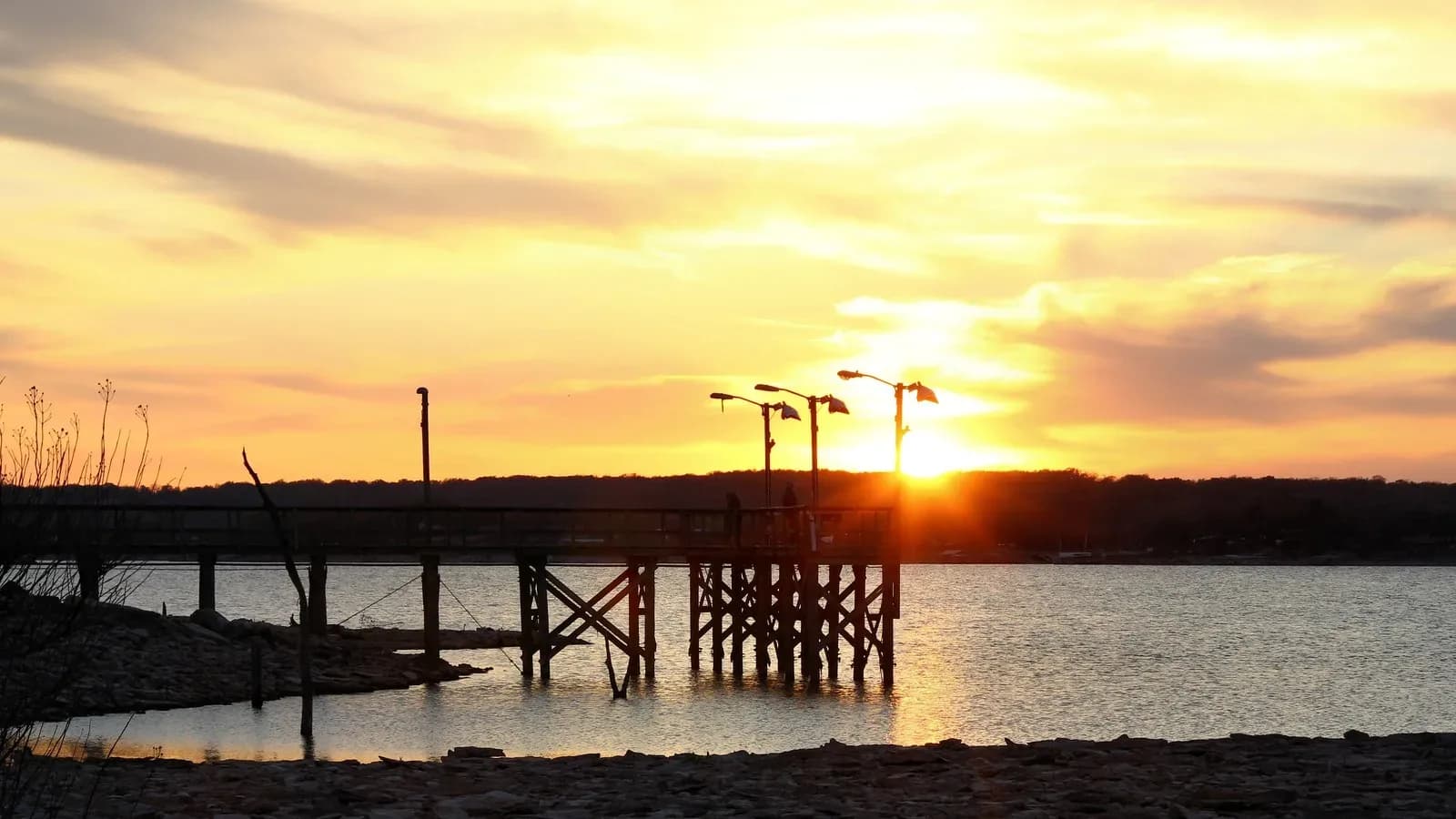 The fishing pier at Lake Brownwood State Park at sunset