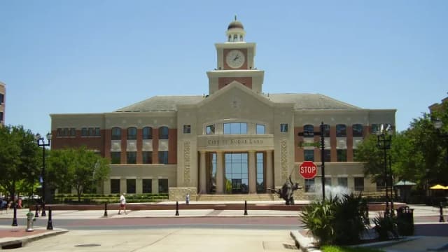 Sugar Land City Hall with its clock tower on a sunny day