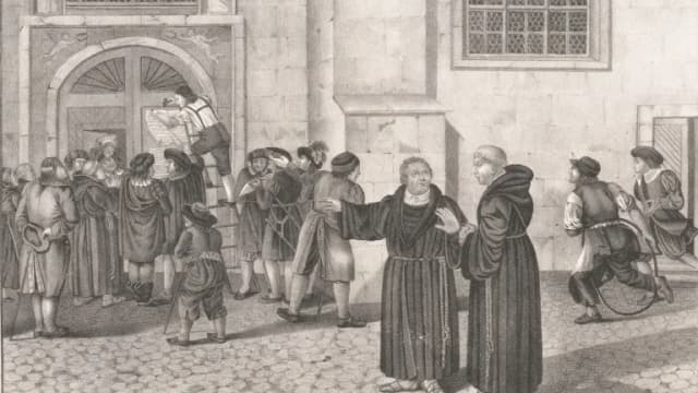 A 19th-century lithograph showing Martin Luther in a monk's robe speaking with another friar while a man on a ladder posts the theses on a church door before a crowd