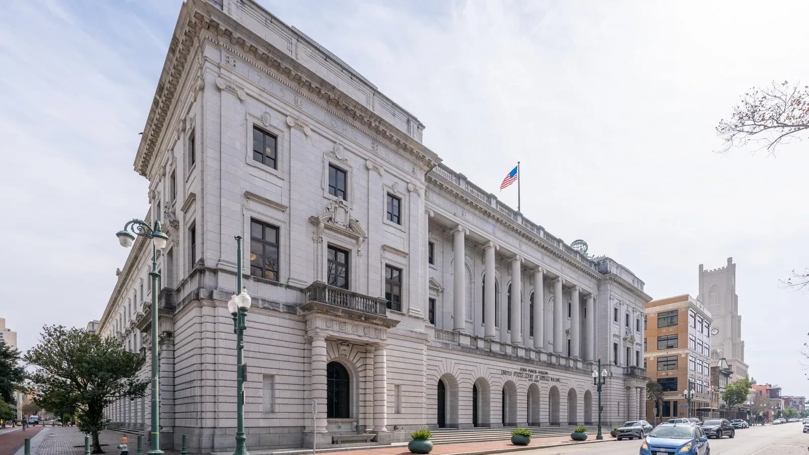 The granite and limestone John Minor Wisdom United States Court of Appeals Building in New Orleans, seen from the street