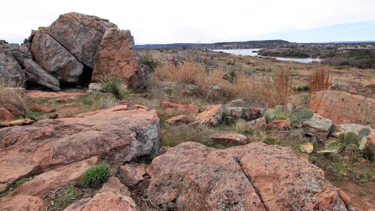 Pink gneiss boulders at an overlook in Inks Lake State Park