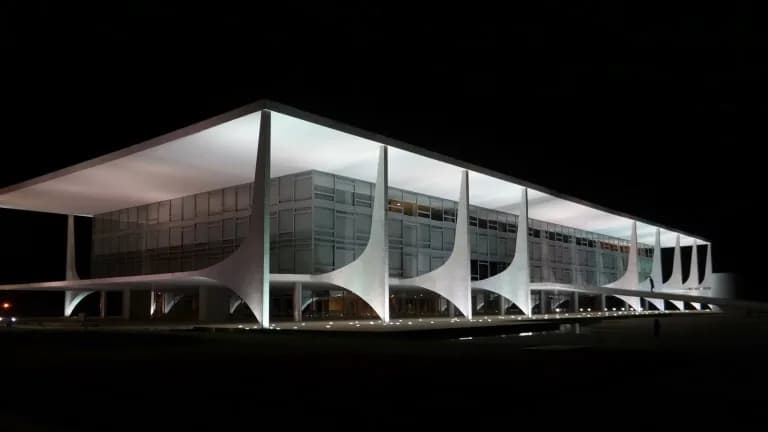 The Planalto Palace, Brazil's presidential office building, lit at night with its curved white columns