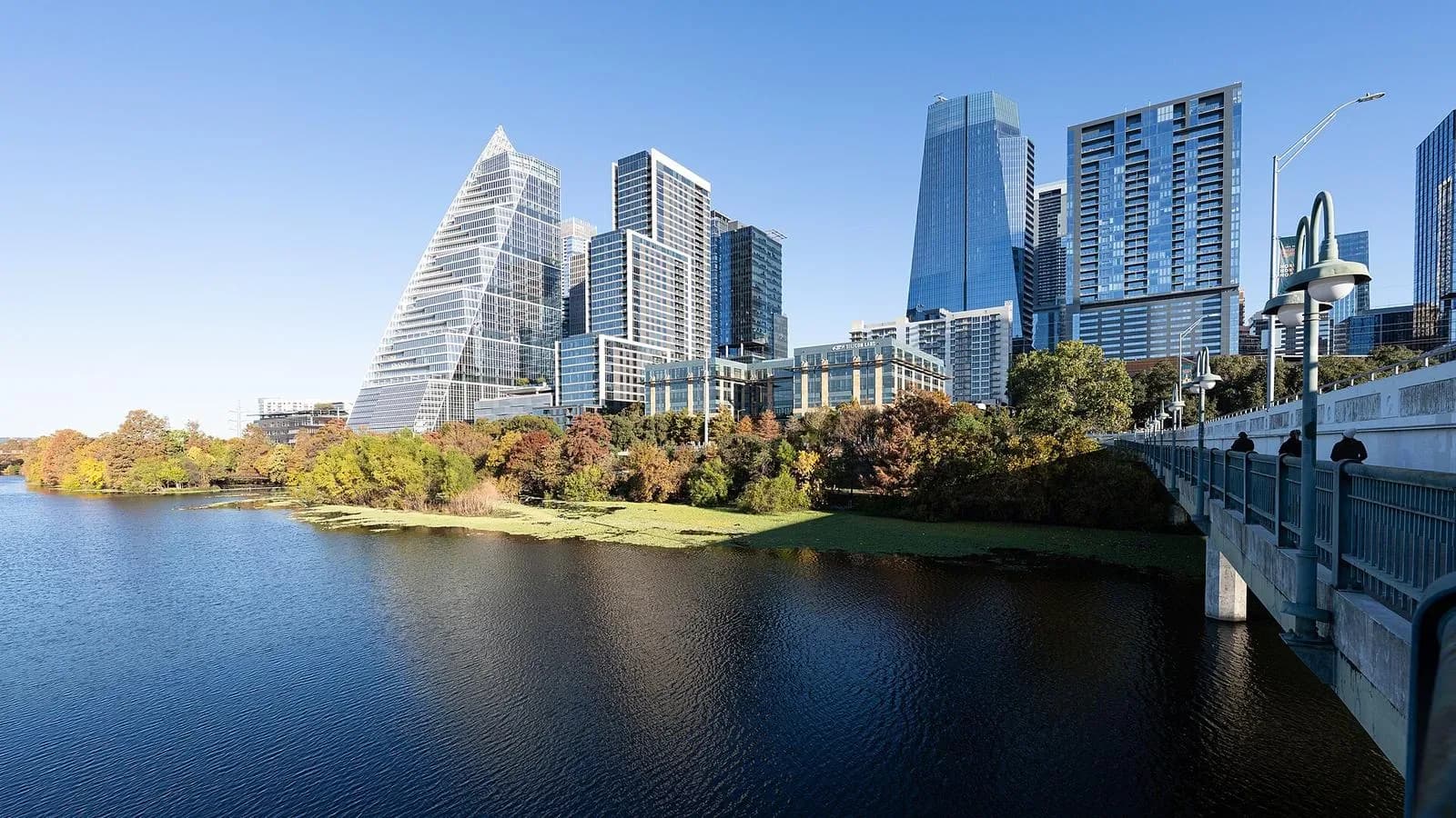 Downtown Austin skyline above Lady Bird Lake and the Congress Avenue Bridge