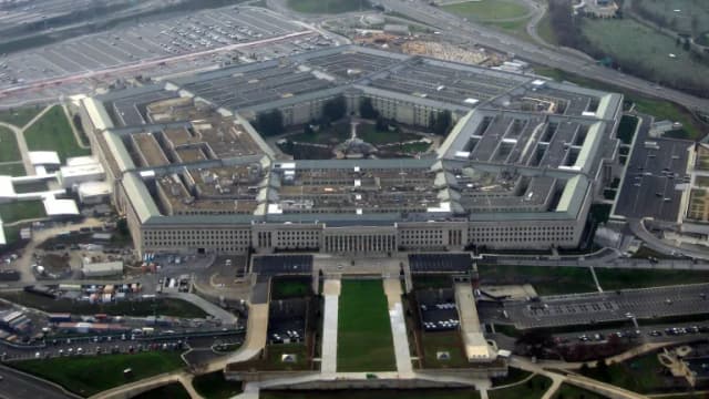 Aerial view of the Pentagon building and its surrounding parking lots and roads in Arlington, Virginia