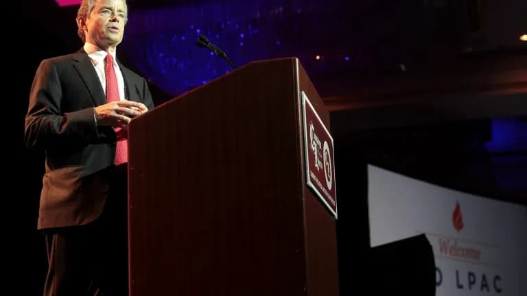 Don Huffines speaking at a podium