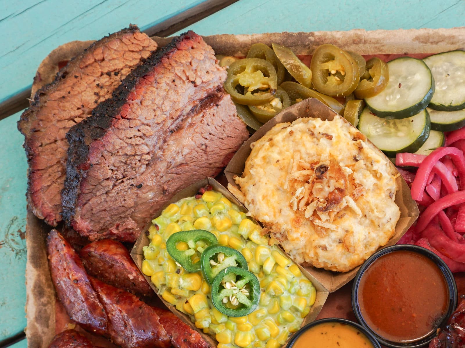 LaVaca BBQ brisket and sausage tray with sides in Port Lavaca, Texas