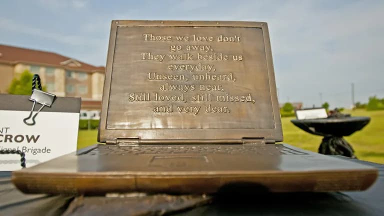 Bronze sculpture with an etched message of comfort at the Fort Hood shooting memorial