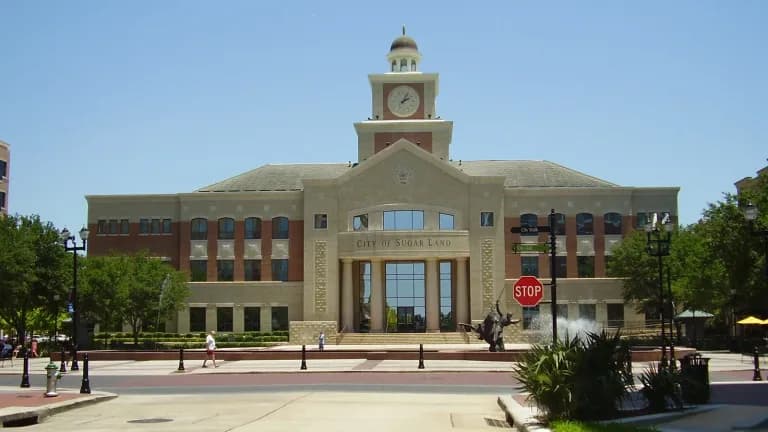 Sugar Land City Hall with its clock tower on a sunny day