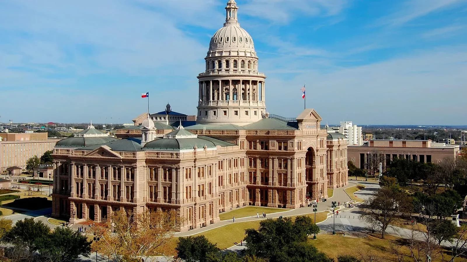 The Texas State Capitol in Austin under a clear sky