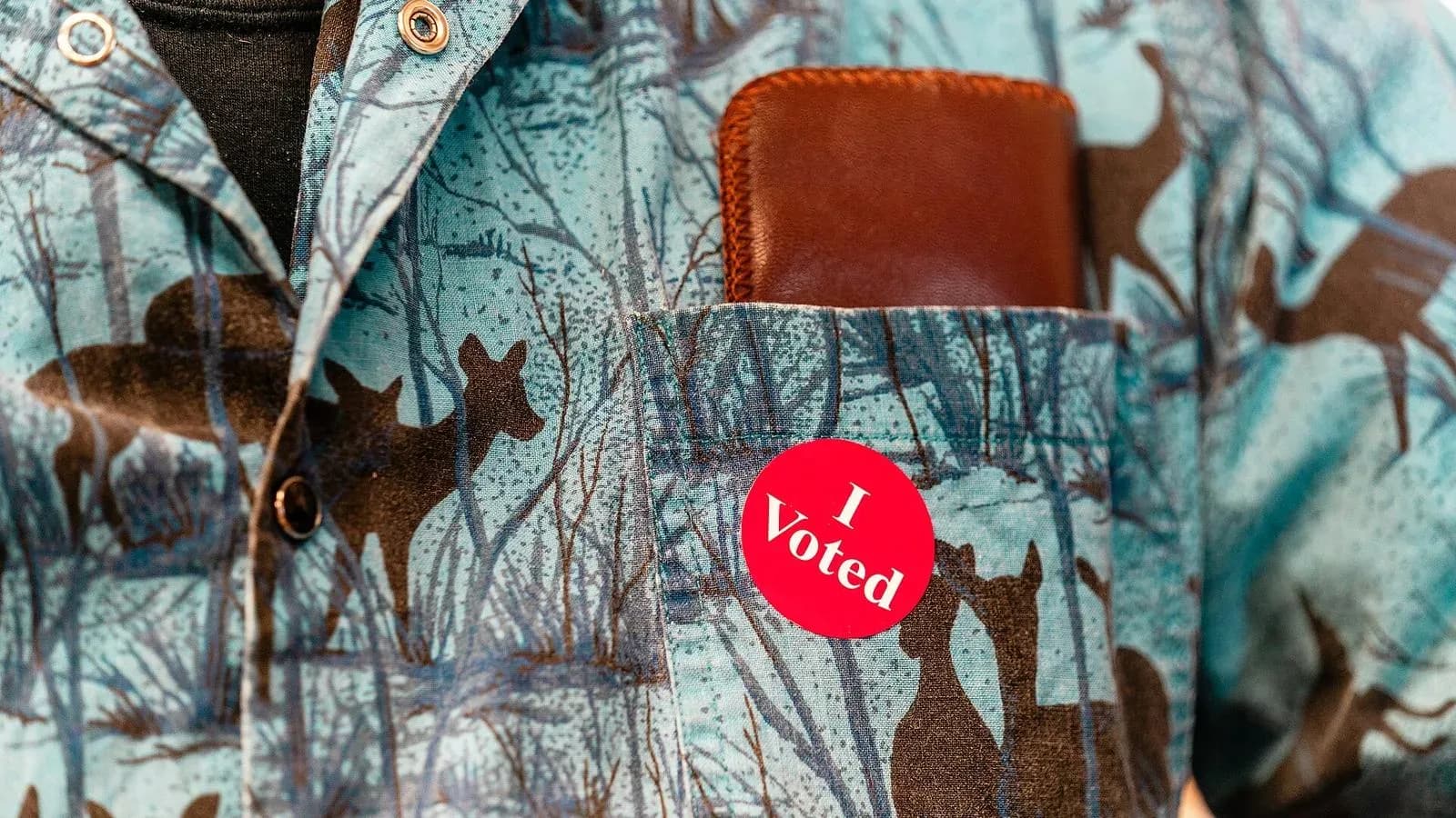 Close-up of an I Voted sticker on a shirt