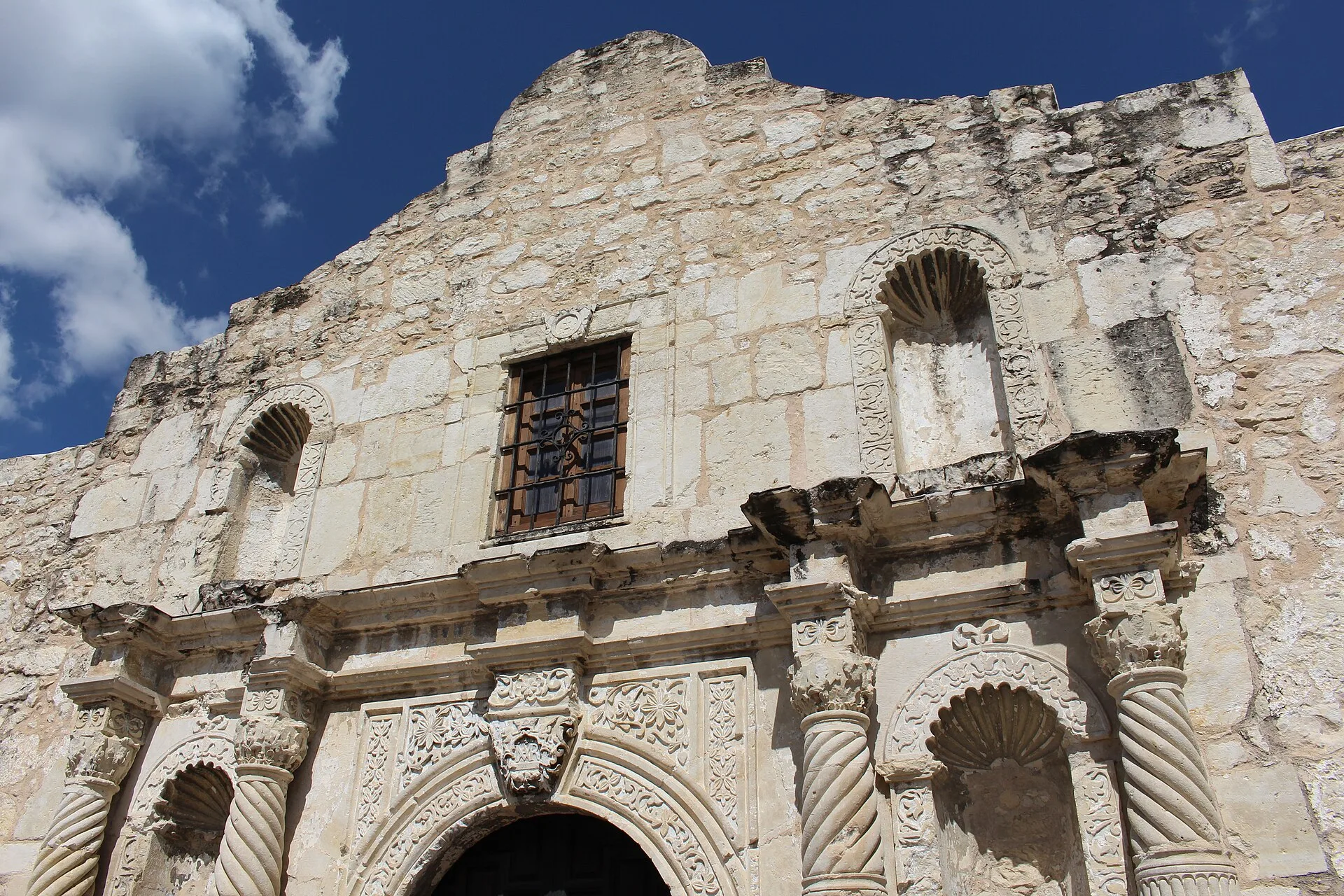 The carved stone facade of the Alamo in San Antonio