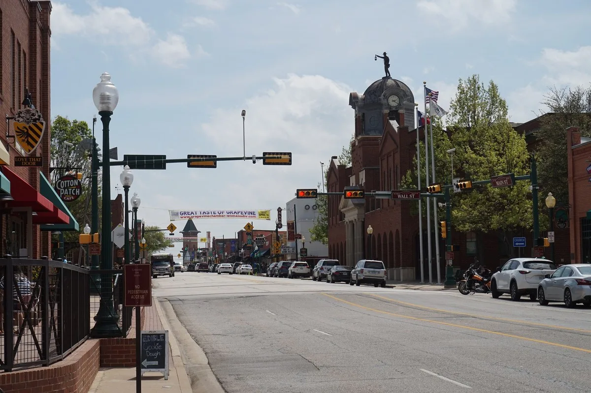 Shops and street lamps along Main Street in downtown Grapevine, Texas