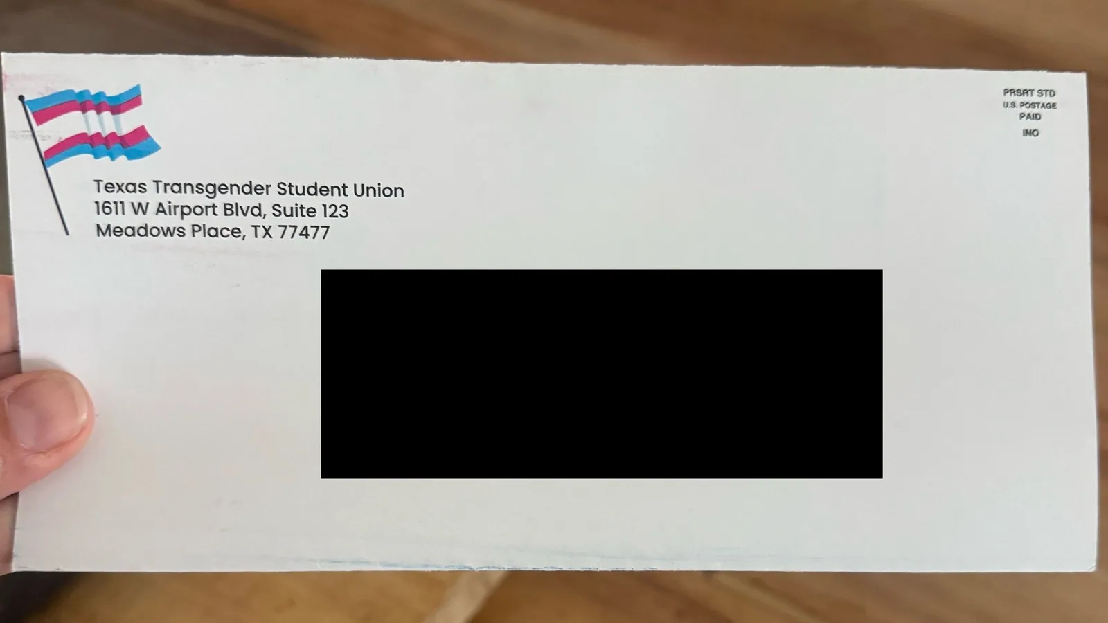 Envelope from the Texas Transgender Student Union with the recipient's address blacked out