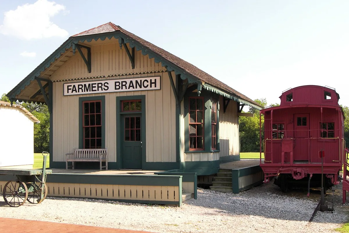 The restored 19th-century Farmers Branch railroad depot, a small wooden building