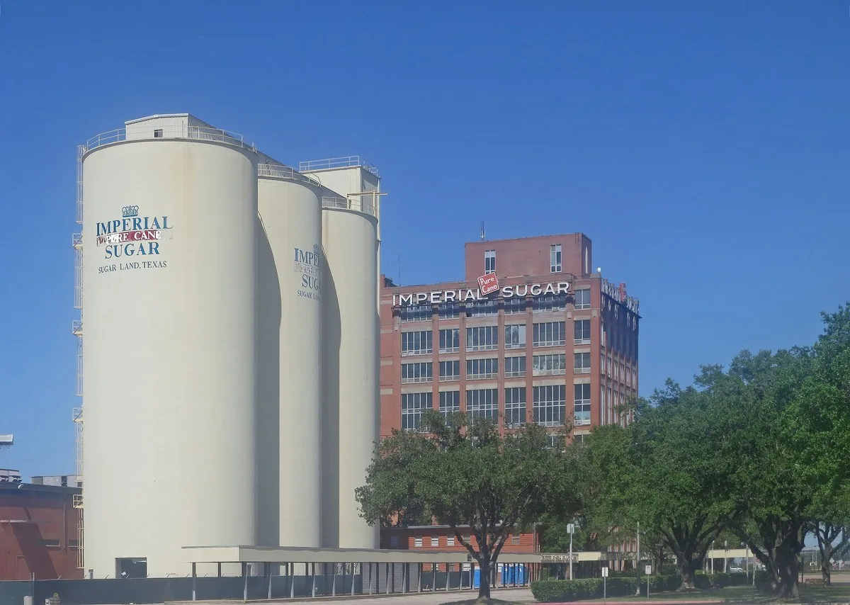 White Imperial Sugar silos and the brick refinery building in Sugar Land