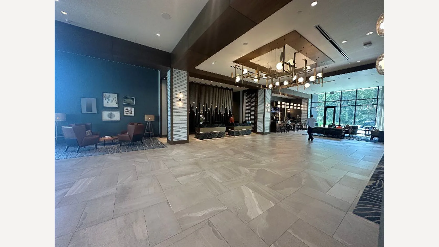 Actual photograph of the Hyatt Regency Conroe lobby in the 2025 valuation report.