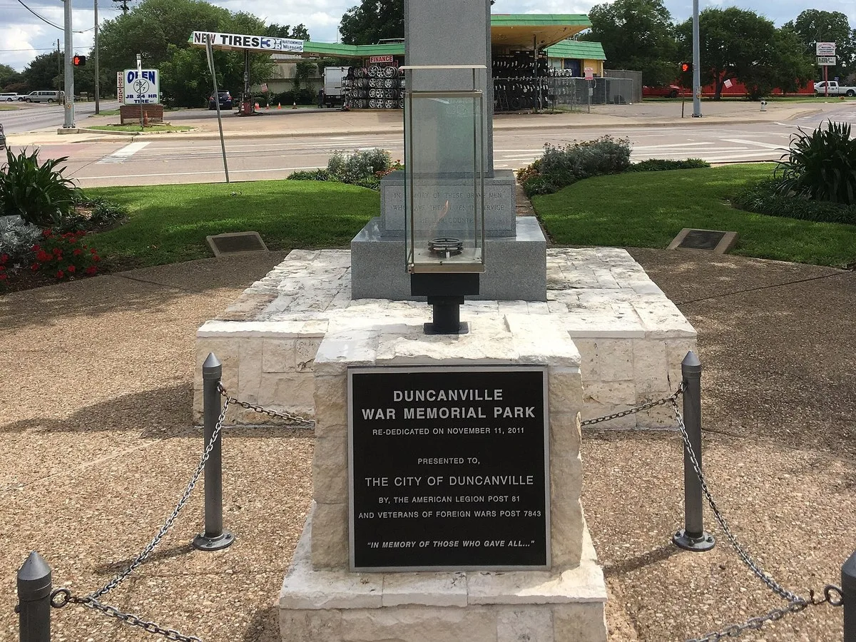 The Duncanville War Memorial and its plaque at Main and Center streets