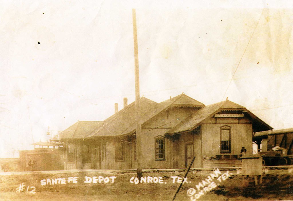 Santa Fe Depot in Conroe, Texas, a wooden passenger station with gingerbread trim