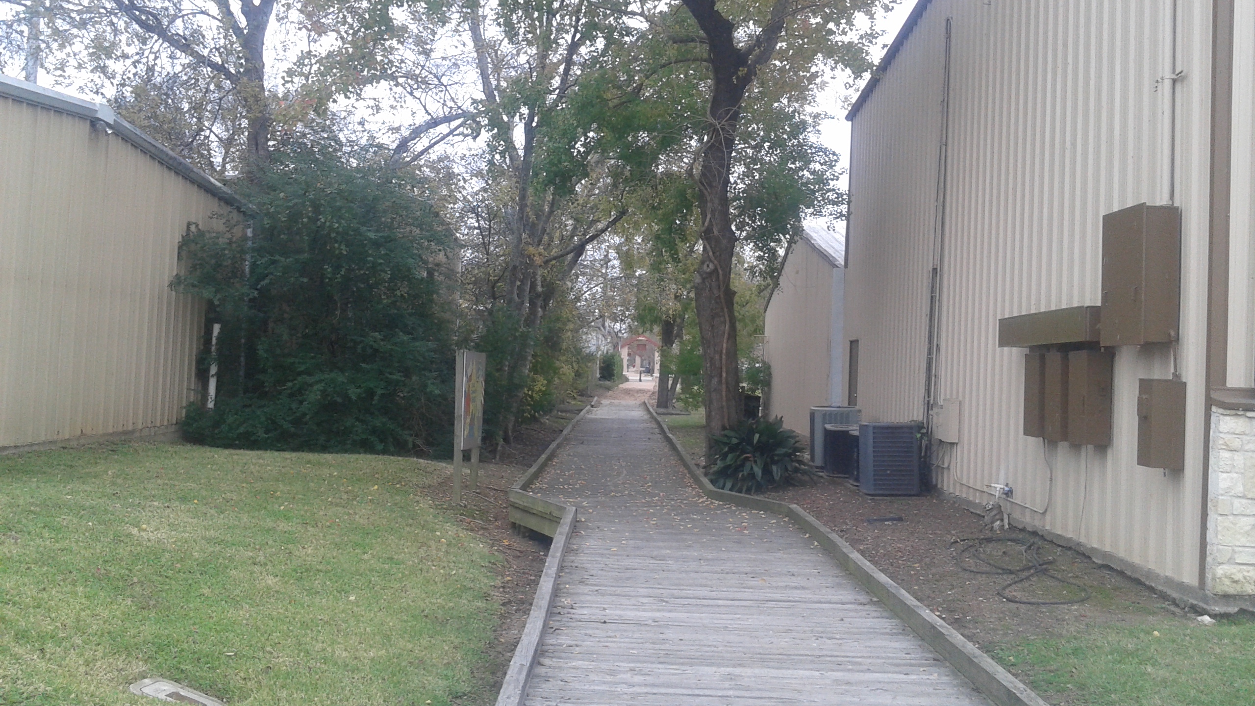 The Magnolia Stroll district with storefronts and public gathering space